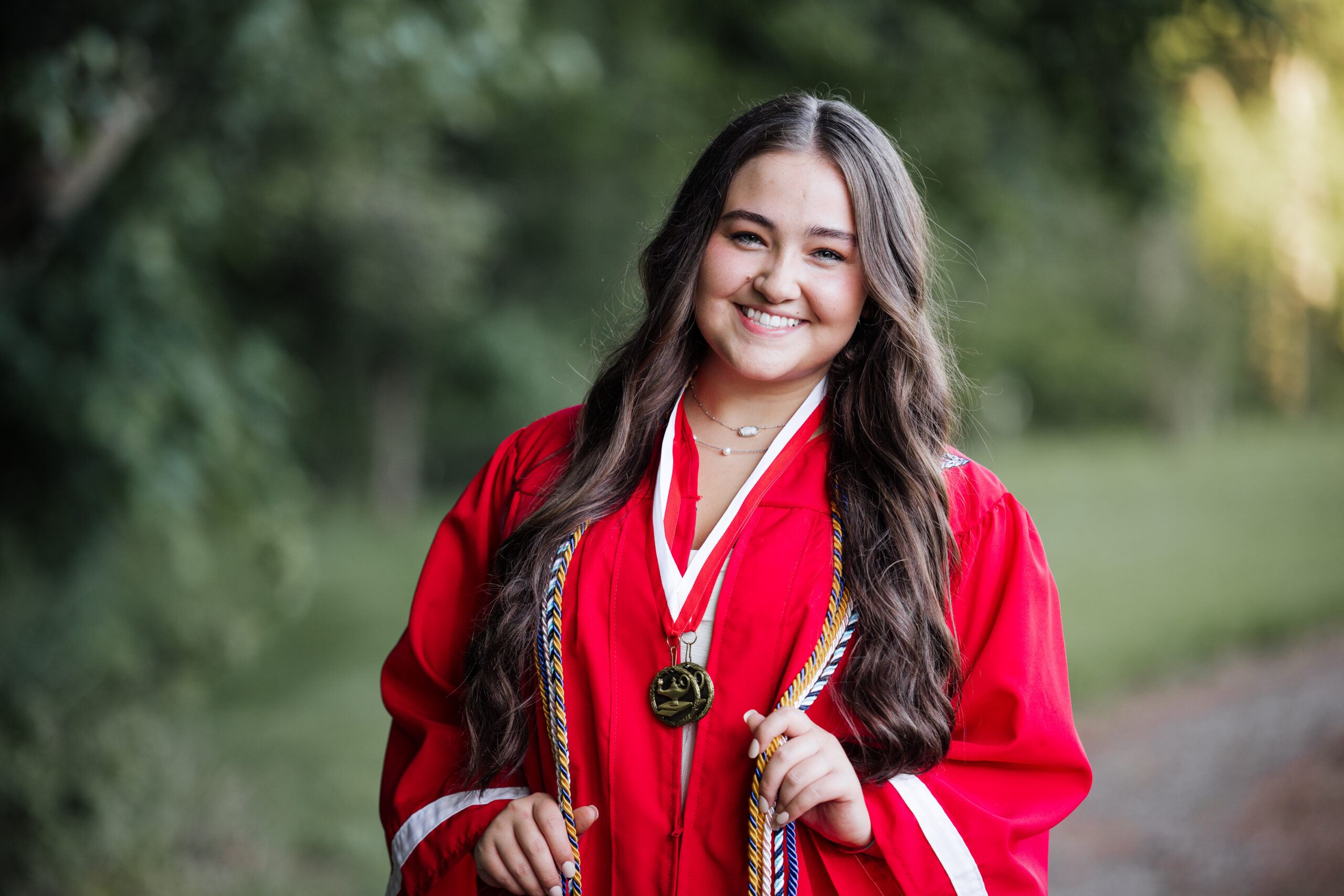girl in cap and gown from Cherokee high School
