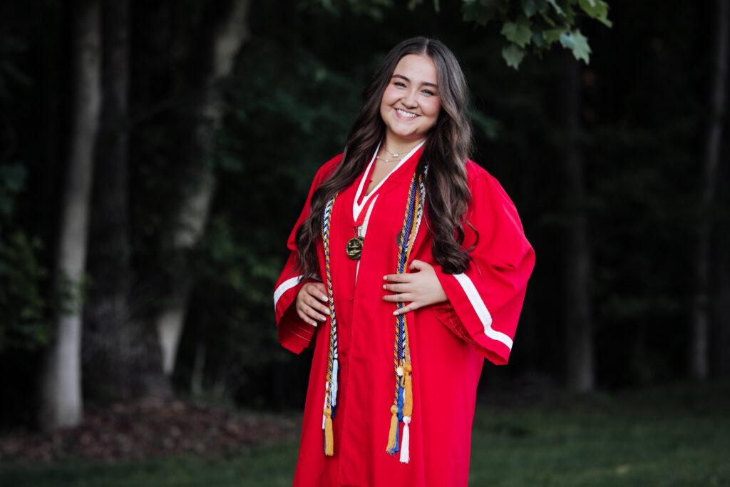 girl wearing red gradution gown from Cherokee high School