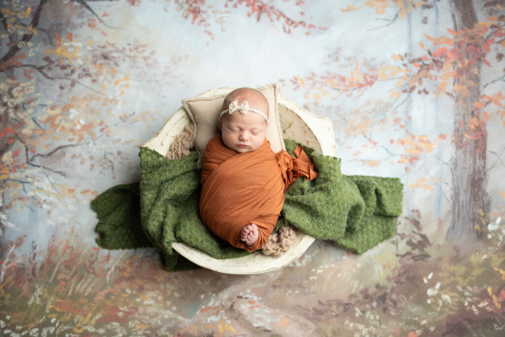 newborn baby fall set up orange green trees 