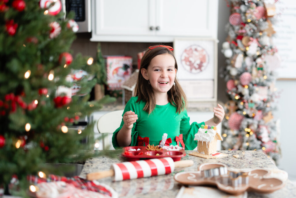 Fun and messy Gingerbread Kitchen Christmas mini session in Canton, GA studio capturing kids enjoying the holidays