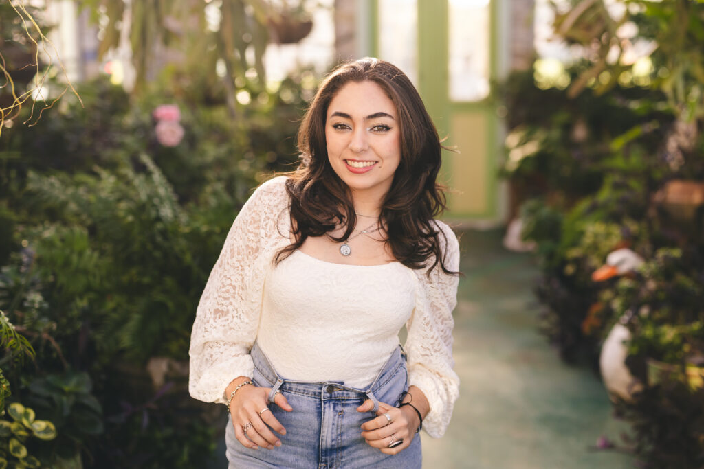 High school senior portrait West Milford Farm Canton GA greenhouse setting