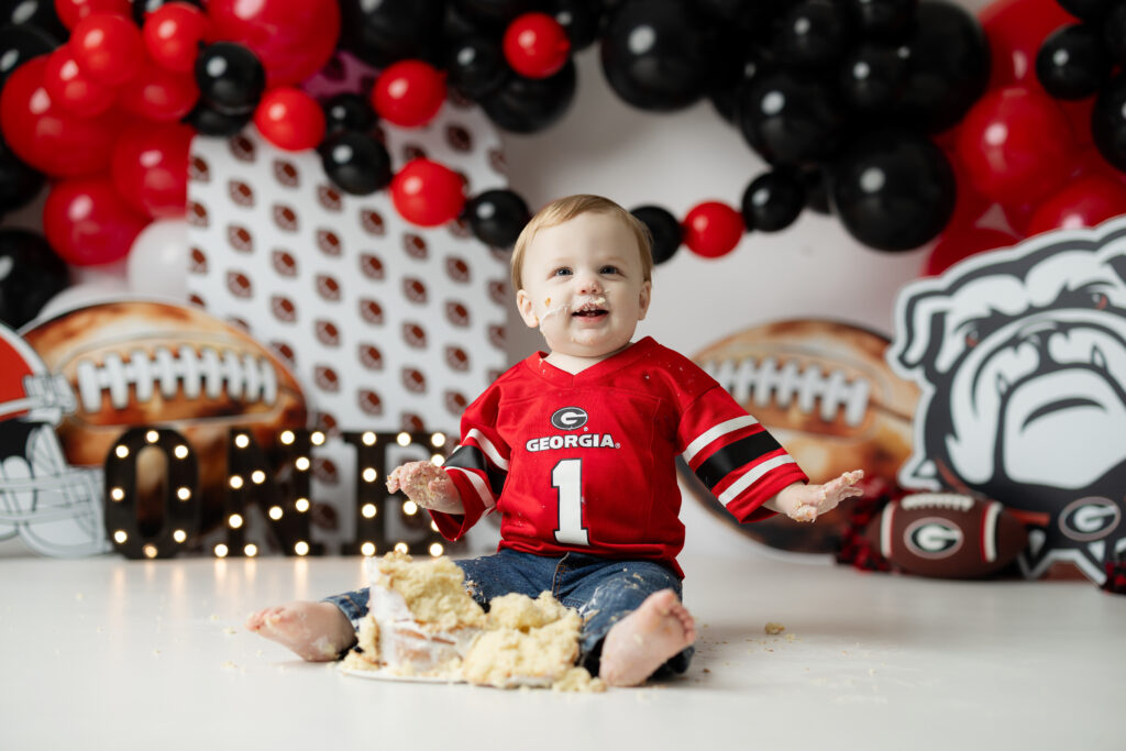 Georgia Bulldogs first birthday cake smash at a Canton GA photography studio